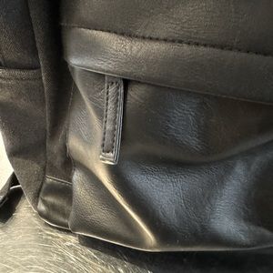 Black denim/leather backpack